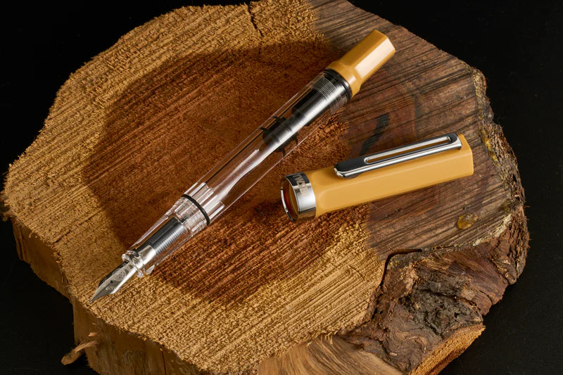 TWSBI ECO Bahama Yellow Fountain Pen
Comes in EF, F, M, B, Stub1.1 nib choices
Colors: Yellow/Clear
Pen cap is able to post onto the back of the pen
Piston Filler Fountain pen.
Simply unscrew the end cap, dip into ink, screw back the end cap, and your done! Ready to write!!