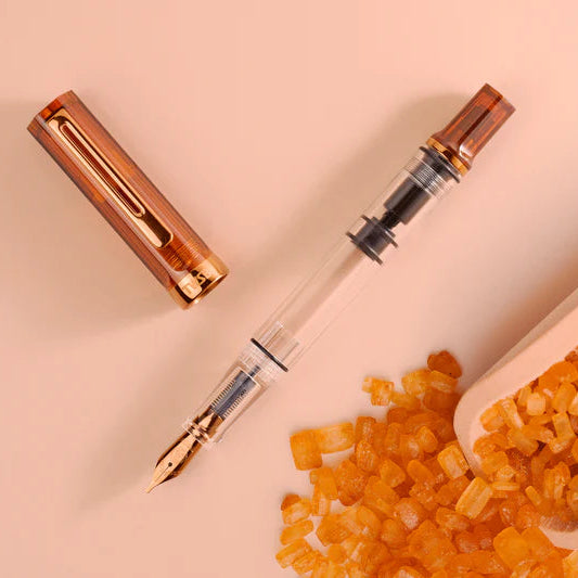 Comes in EF, F, M, B, Stub1.1 nib choices
Colors: Creme/Clear/RoseGold
Pen cap is able to post onto the back of the pen
Piston Filler Fountain pen.
Simply unscrew the end cap, dip into ink, screw back the end cap, and you're done! Ready to write!!
Pen cap has an inner cap to ensure a perfect seal when stored away.
Made for the beginner who just wants to try out fountain pens, all the way to the experts. A good everyday worker.
Please note: Ink is NOT included
A quick no brai
