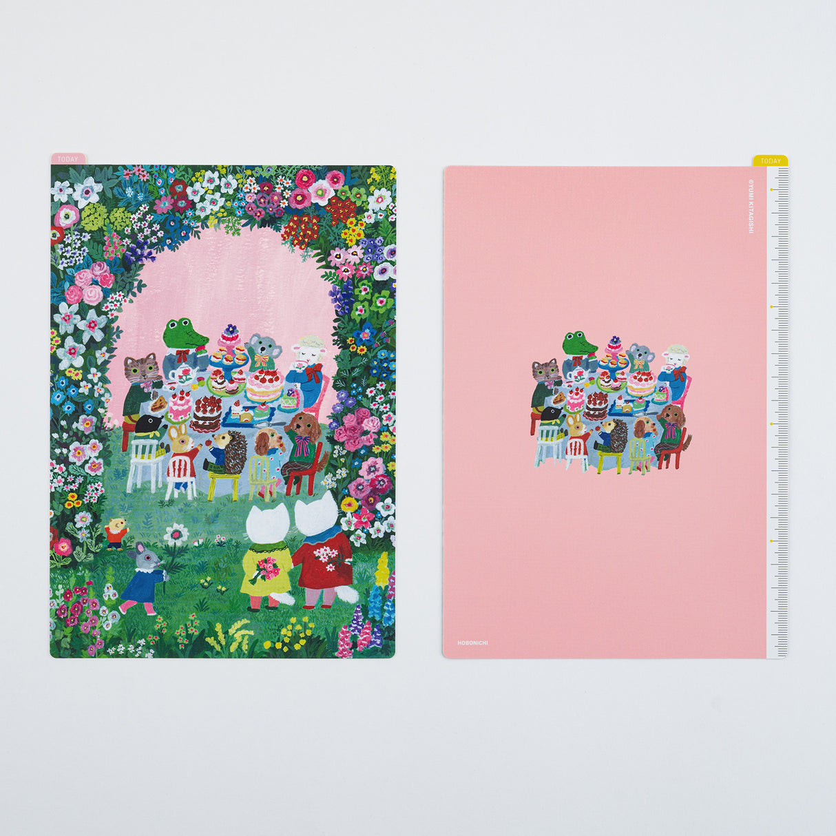 The A5 size depicts animals spending their time in the garden. You can see that there is a lot of cake on the table, and everyone looks so happy. The back side has a background in gentle pink.