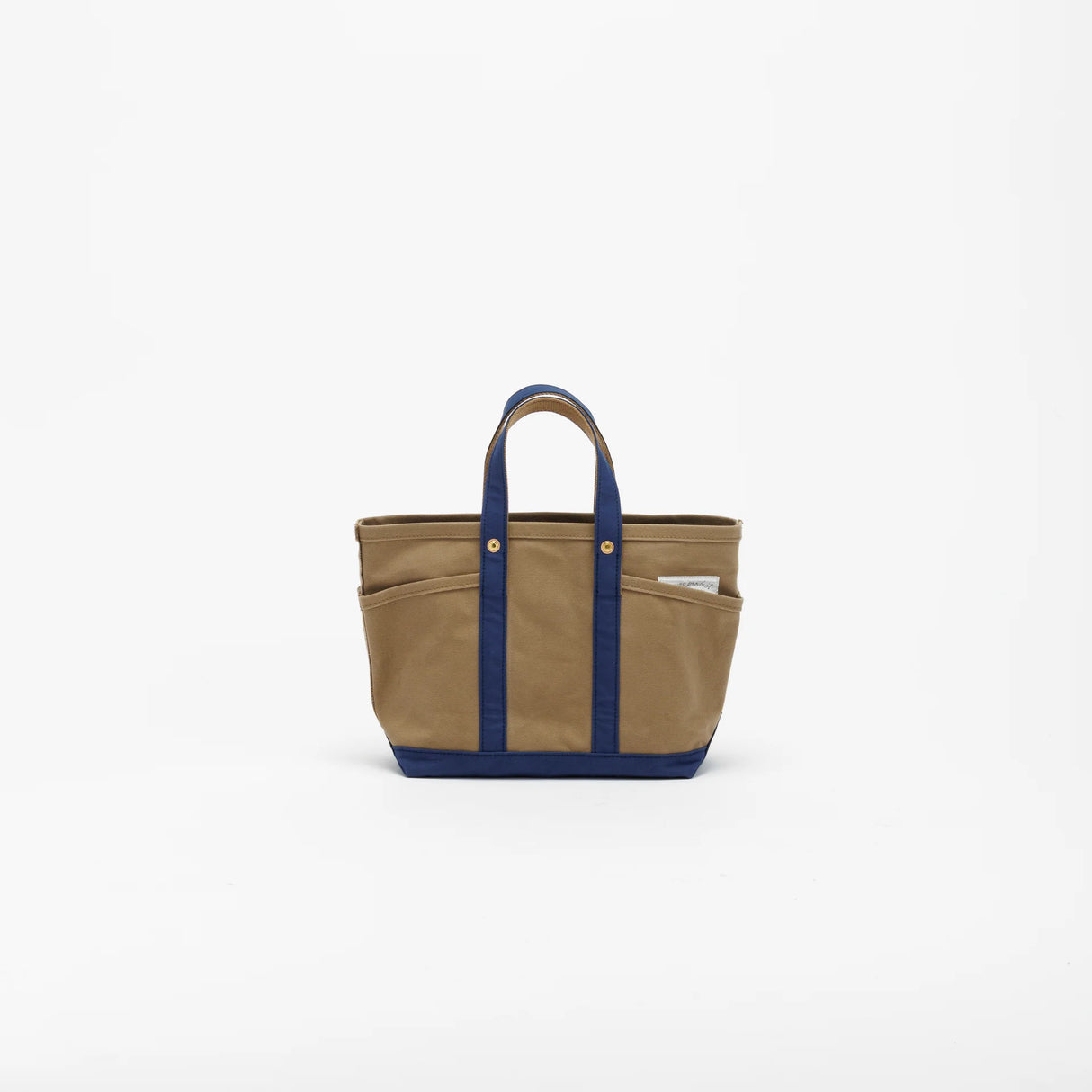 The SUPERIOR LABOR Mini Tote Bag
A simple, timeless canvas bag designed for everyday life.
Its compact size is just right for daily essentials, while the four outer pockets keep your glasses, keys, favorite pens, or notebook neatly organized.
They make it easy to stay tidy and add a touch of extra storage without changing the clean look of the bag.
Size: W37×H23.5×D12.5cm
Canvas Products
Painted areas may be affected by friction or water, which can cause color transfer. Please handle with care.