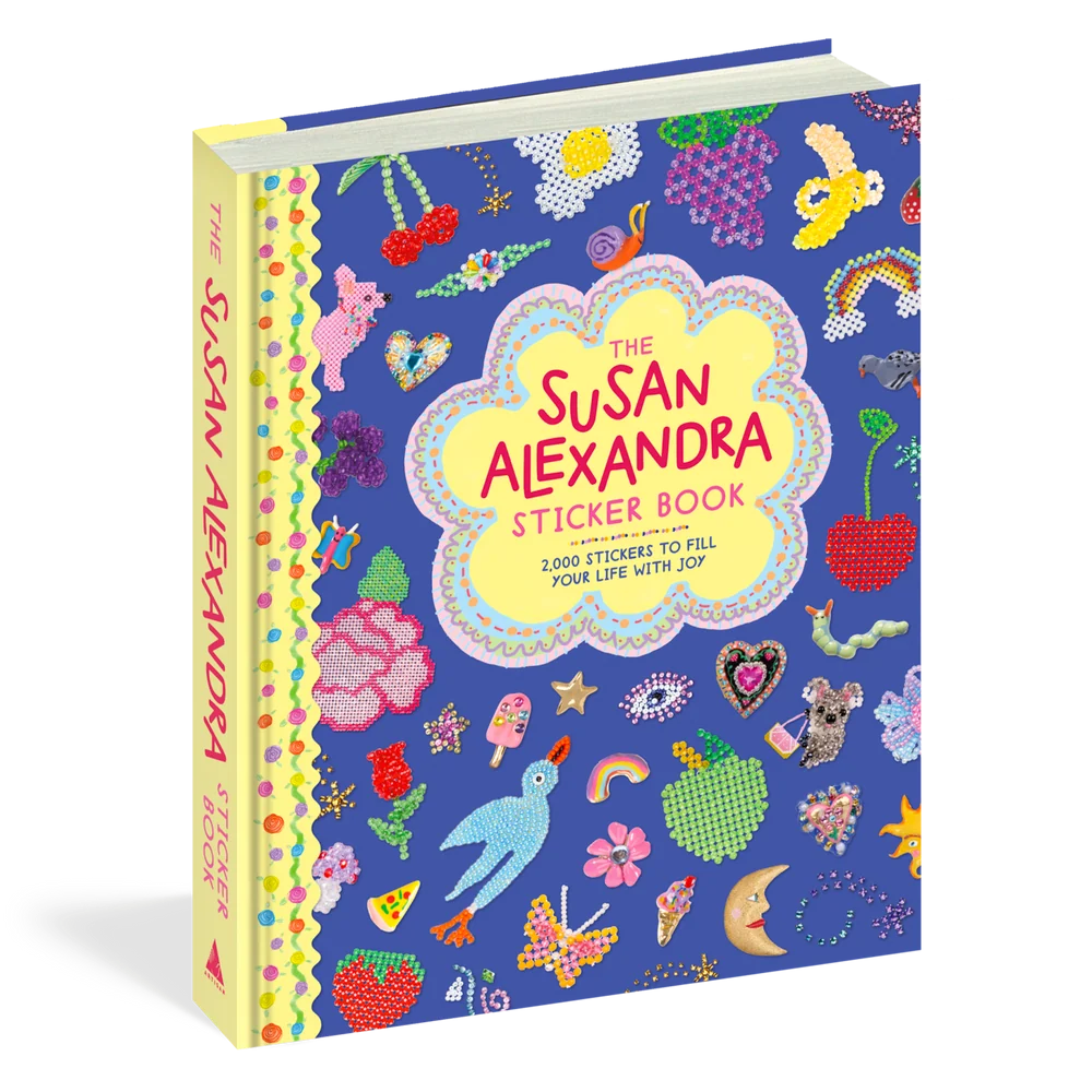 Step inside the joyful world of beloved accessory brand Susan Alexandra with this hardcover sticker book, featuring more than 700 stickers that can be used to decorate your life with a bold sense of color, humor, and play.
Susan Alexandra’s signature beaded goods and playful designs are transformed across more than two hundred pages of visual delight, filled with peel-away stickers that evoke the brand’s iconic motifs of flowers, foods, animals and critters, shoes, purses, charms, cheeky phrases, and other