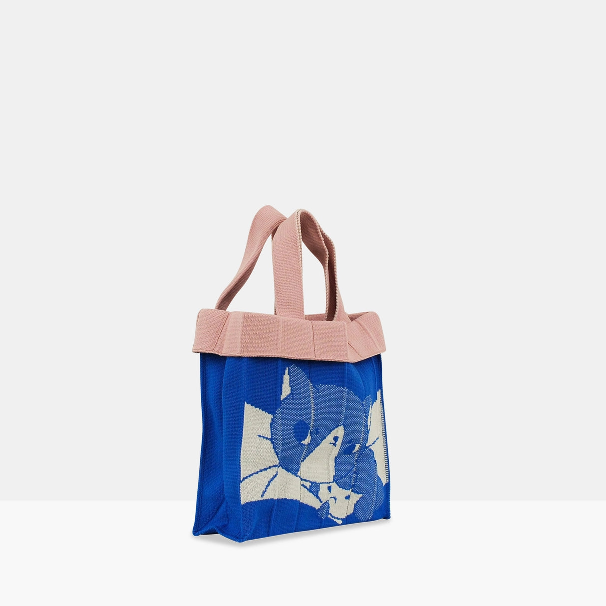 The Co-Knitty bag is a small hand carry bag perfect for your necessities such as phone and wallet.
Recycled polyester (one tote bag is made from approximately 1.5 recycled plastic bottles)
A cute hand carry at the size of 20 x 20cm x 6.5cm(depth), 188g
Easily clean the bag by tossing it into the washing machine (laundry net recommended)
Wrinkle free, so feel free to fold away when you don't need it!
Made locally in Japan