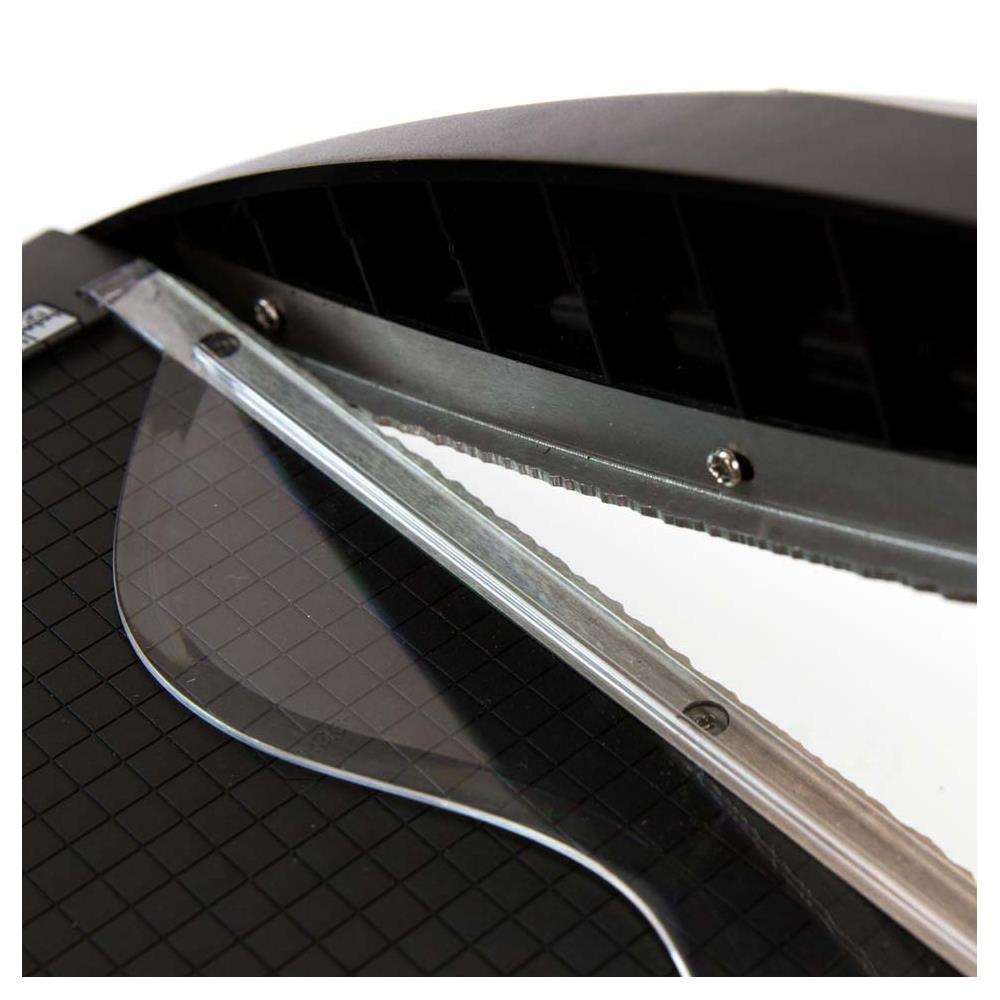 The Tim Holtz Deckle Torn Edge Trimmer gives your projects the perfect distressed deckle edge effect with maximum control and precision. Designed to provide effortlessly repeatable deckle effects, this new cutting tool from Tim Holtz and Tonic Studios is essential for any crafter looking to bring life to their next design. Combine with different papers and card stock for varying torn edge effects.