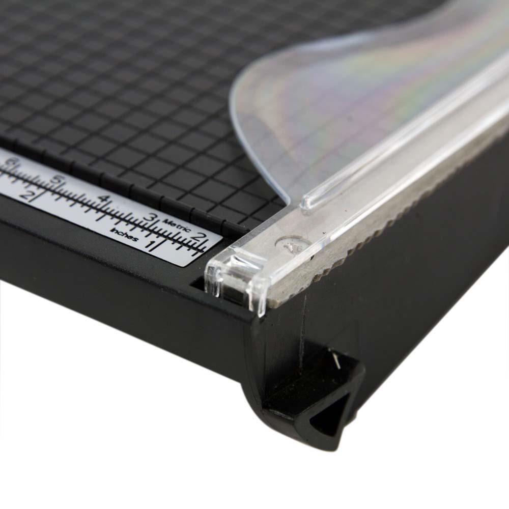 The Tim Holtz Deckle Torn Edge Trimmer gives your projects the perfect distressed deckle edge effect with maximum control and precision. Designed to provide effortlessly repeatable deckle effects, this new cutting tool from Tim Holtz and Tonic Studios is essential for any crafter looking to bring life to their next design. Combine with different papers and card stock for varying torn edge effects.