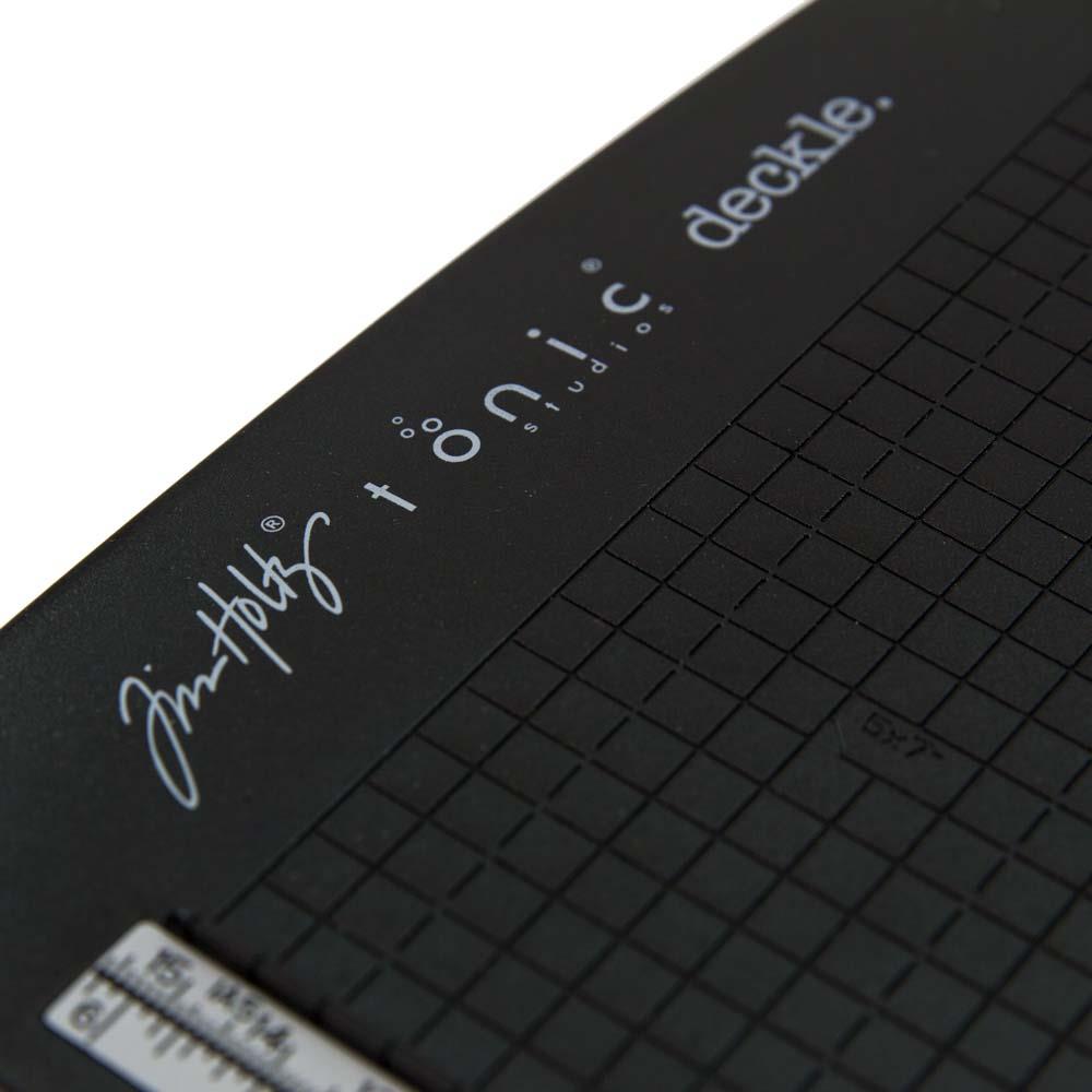 The Tim Holtz Deckle Torn Edge Trimmer gives your projects the perfect distressed deckle edge effect with maximum control and precision. Designed to provide effortlessly repeatable deckle effects, this new cutting tool from Tim Holtz and Tonic Studios is essential for any crafter looking to bring life to their next design. Combine with different papers and card stock for varying torn edge effects.