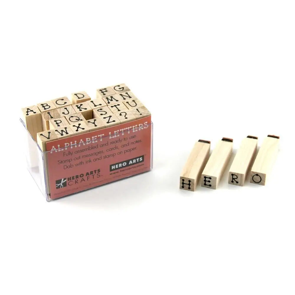 The Hero Arts Printer's Type Alphabet set contains 28 woodblock stamps in a cute dotted font.
Hero Arts woodblock stamp sets are designed and packaged for stamping perfection. They are mounted on North American maple from sustainable forests for precision and long-lasting quality. Each set features original designs from our award-winning design team that matches the styles and trends of the day.