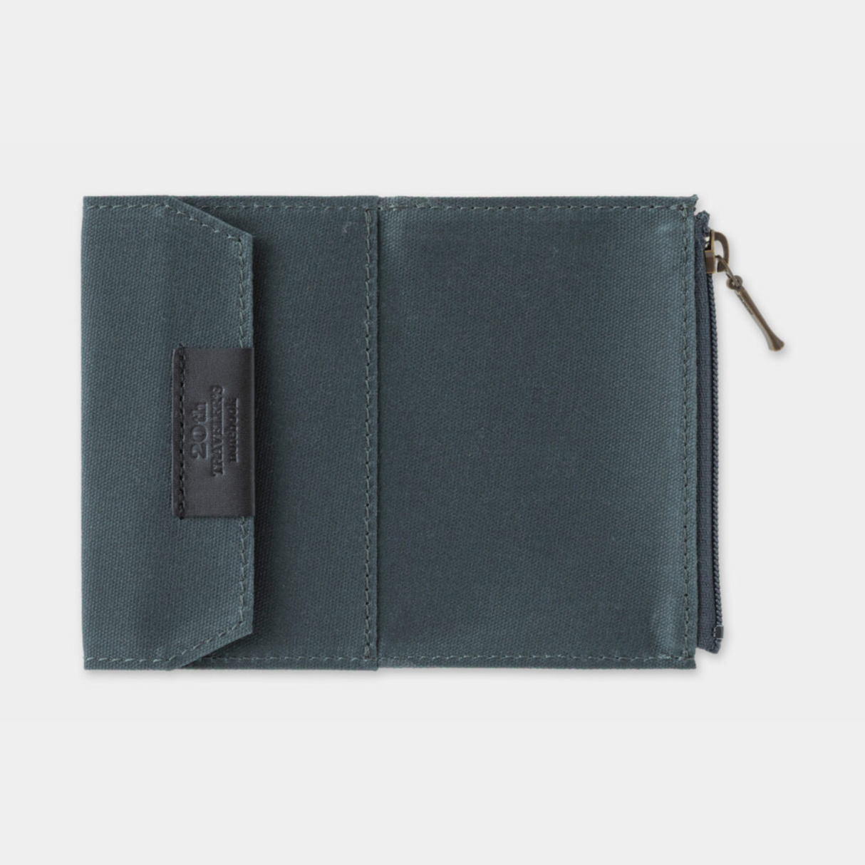 To commemorate this 20th anniversary, we’ve created a new size of TRAVELER’S notebook.
It is TRAVELER’S notebook Card Size. This TRAVELER’S notebook is always with you, even in your daily life. Whether it’s a sudden idea, information you learned or overheard, or something important you don’t want to forget— whenever and wherever you feel like writing, you can quickly grab the notebook and jot it down.
This set includes TRAVELER’S notebook Card Size, Refill Notebooks, Cotton Zipper Case, Kraft Paper Folder