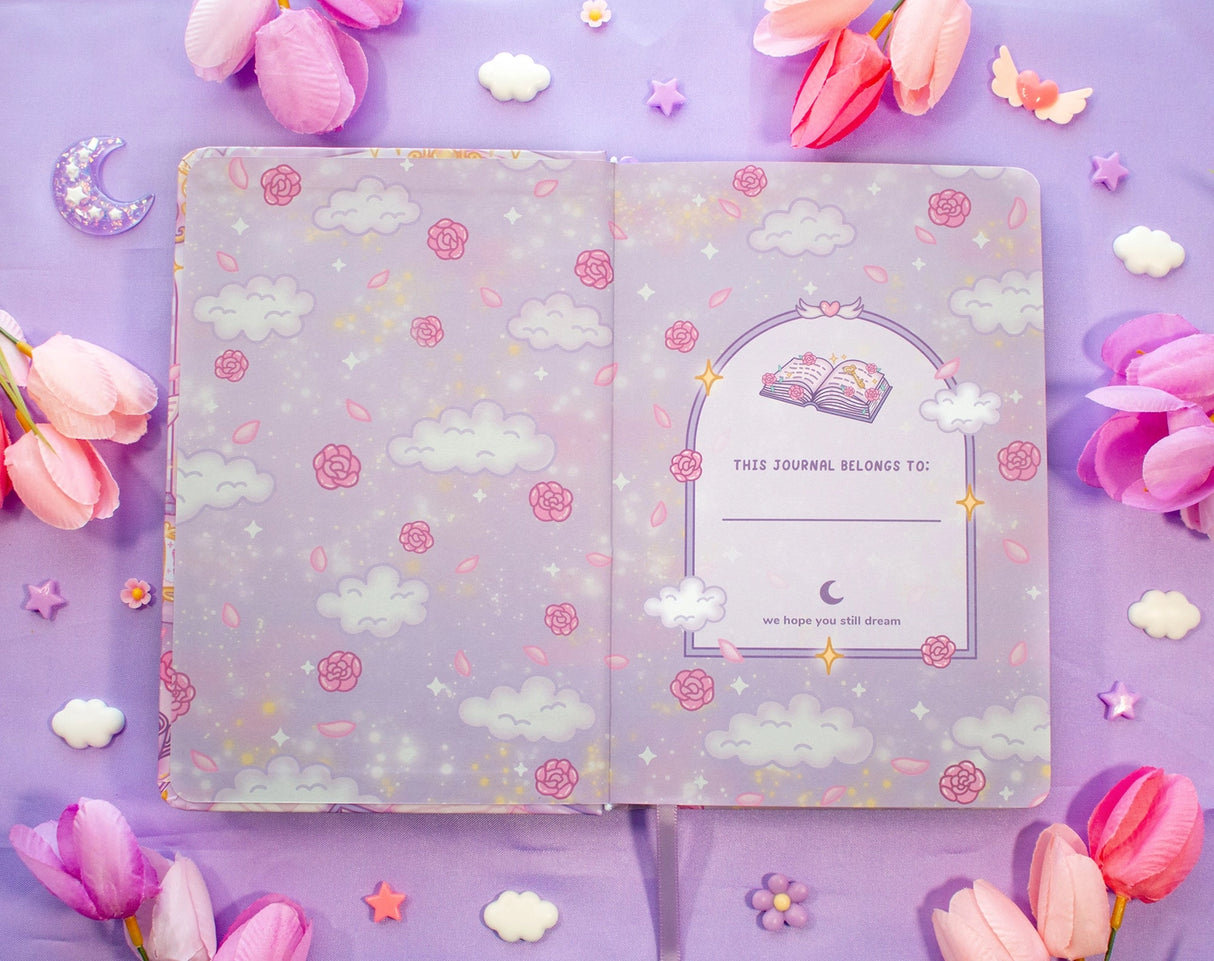 Unicorn Eclipse - Pastel Academia Dotted Journal
✧Size & Materials✧
Size: A5 (approximately 5.8 x 8.3 inches)
Smooth hardcover, rounded corners
160 dot grid pages, 140 gsm
Includes ribbon bookmark, elastic band, and back pocket