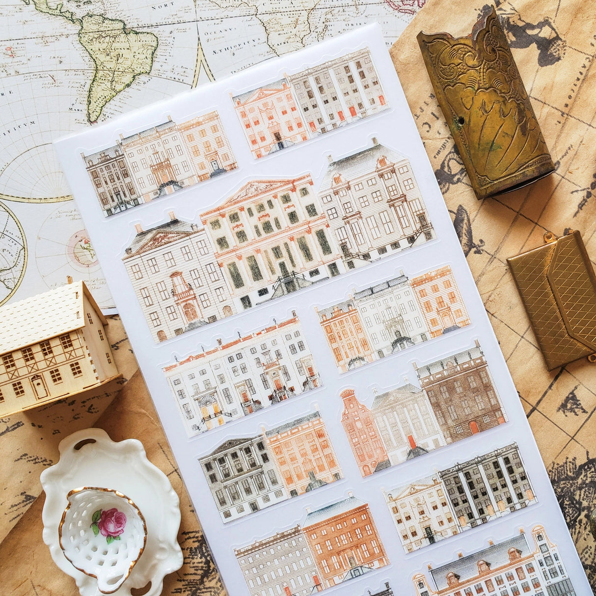 🏢 Step into a watercolor cityscape of timeless charm with this stunning sticker sheet. From stately mansions and grand public halls to quaint vintage facades, every delicate sketch captures the artistry of historic architecture. A treat for architecture admirers and art lovers alike, this sheet will bring a touch of sophistication and old-world beauty to any creative project.