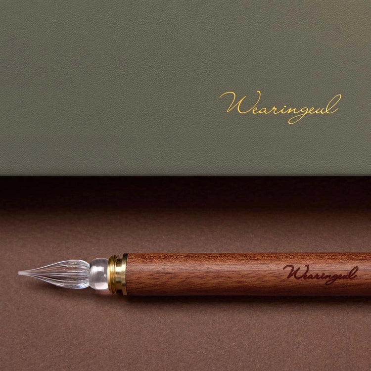 A modular glass pen that combines a glass nib with an elegant rosewood body.
The modular design allows the pen to be used for many years to come due to its easy nib replacement system. Designed to be easy to use and clean, the nib can be detached easily and lightly rinsed with water for cleaning.
The screw on brass cap allows for safe transport and storage making it perfect for use on the go. 