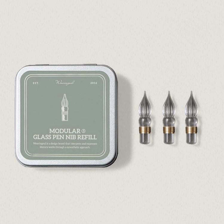 A refill set designed to extend your glass pen's life. This set includes 3 replacement nibs in a metal tin with foam cushion for safe keeping.
The nibs use a screw type mechanism for easy replacement and cleaning.
Compatible with Wearingeul Modular Glass Pen