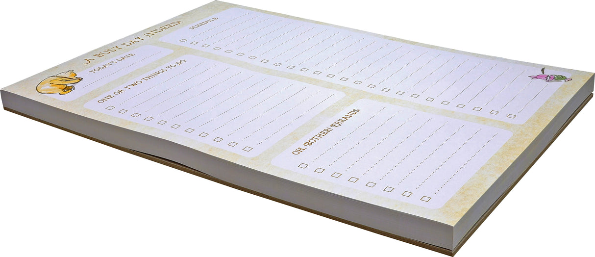 Winnie-The-Pooh Daily Planner Note Pad
Manage each busy day with the help of Winnie-the-Pooh and Piglet, too! Sheets of daily to-do lists take the guesswork out of planning. Versatile pad allows you to easily jot down the date, things to do, errands, and your schedule. Each sheet tears off cleanly, allowing you to take your plans wherever you go. Feel satisfyingly productive as you check off each accomplishment! Simplify your life with lists.
Enjoy 60 sheets for all your planning needs. Thick, smooth-fin