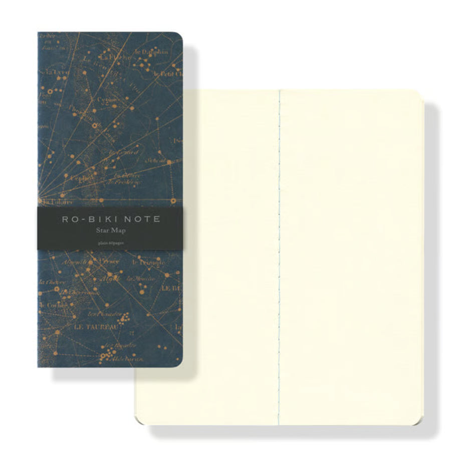 The RO‑BIKI Note is a beautifully crafted Japanese notebook known for its distinctive waxed paper cover, which gains character the more you use it. Over time, the cover softens, develops a natural patina, and becomes uniquely yours—making every notebook feel personal and well‑loved.
Inside, you’ll find high‑quality blank paper ideal for writing, sketching, planning, or journaling. Its compact size makes it perfect for everyday carry, while the durable construction ensures it holds up to frequent use.
Thes
