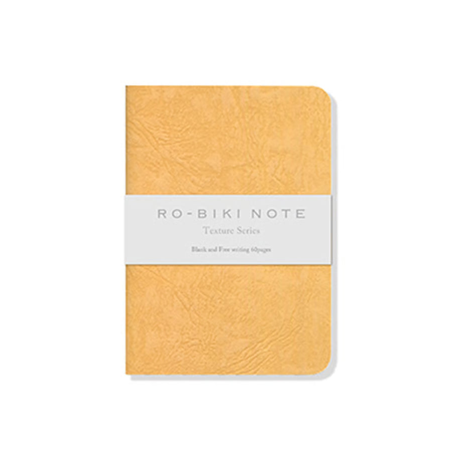 The RO‑BIKI Note is a beautifully crafted Japanese notebook known for its distinctive waxed paper cover, which gains character the more you use it. Over time, the cover softens, develops a natural patina, and becomes uniquely yours—making every notebook feel personal and well‑loved.