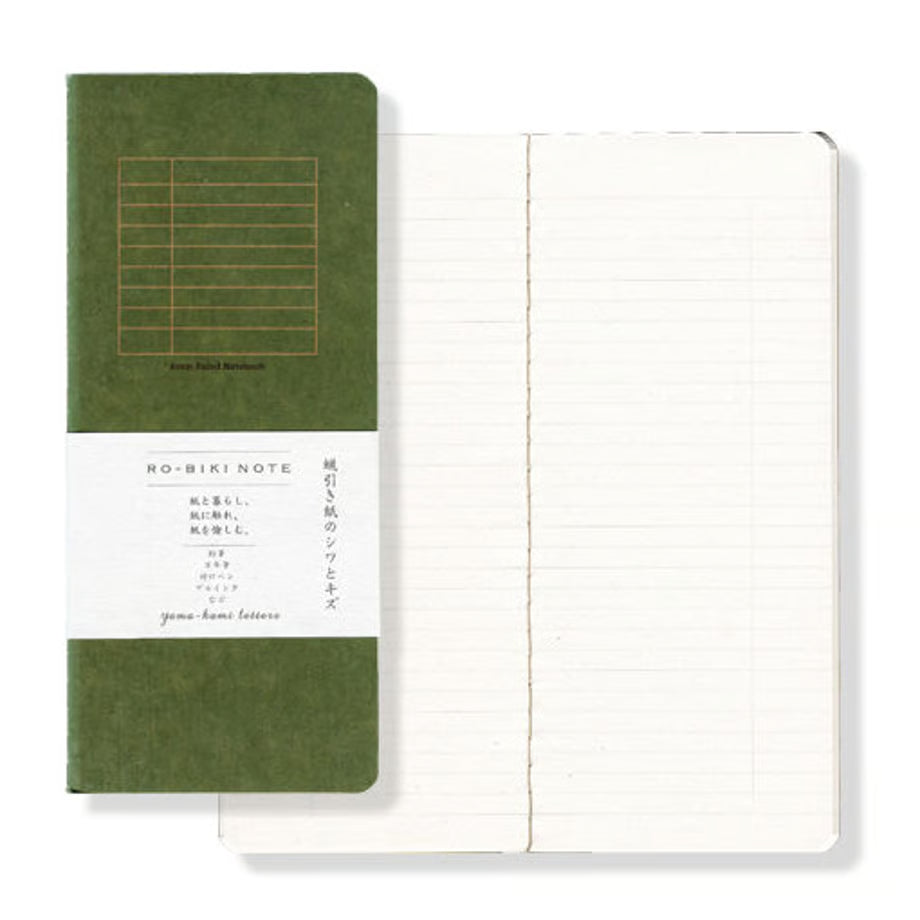 The RO‑BIKI Note is a beautifully crafted Japanese notebook known for its distinctive waxed paper cover, which gains character the more you use it. Over time, the cover softens, develops a natural patina, and becomes uniquely yours—making every notebook feel personal and well‑loved.
Inside, you’ll find high‑quality 6mm ruled paper ideal for writing, sketching, planning, or journaling. Its compact size makes it perfect for everyday carry, while the durable construction ensures it holds up to frequent use.