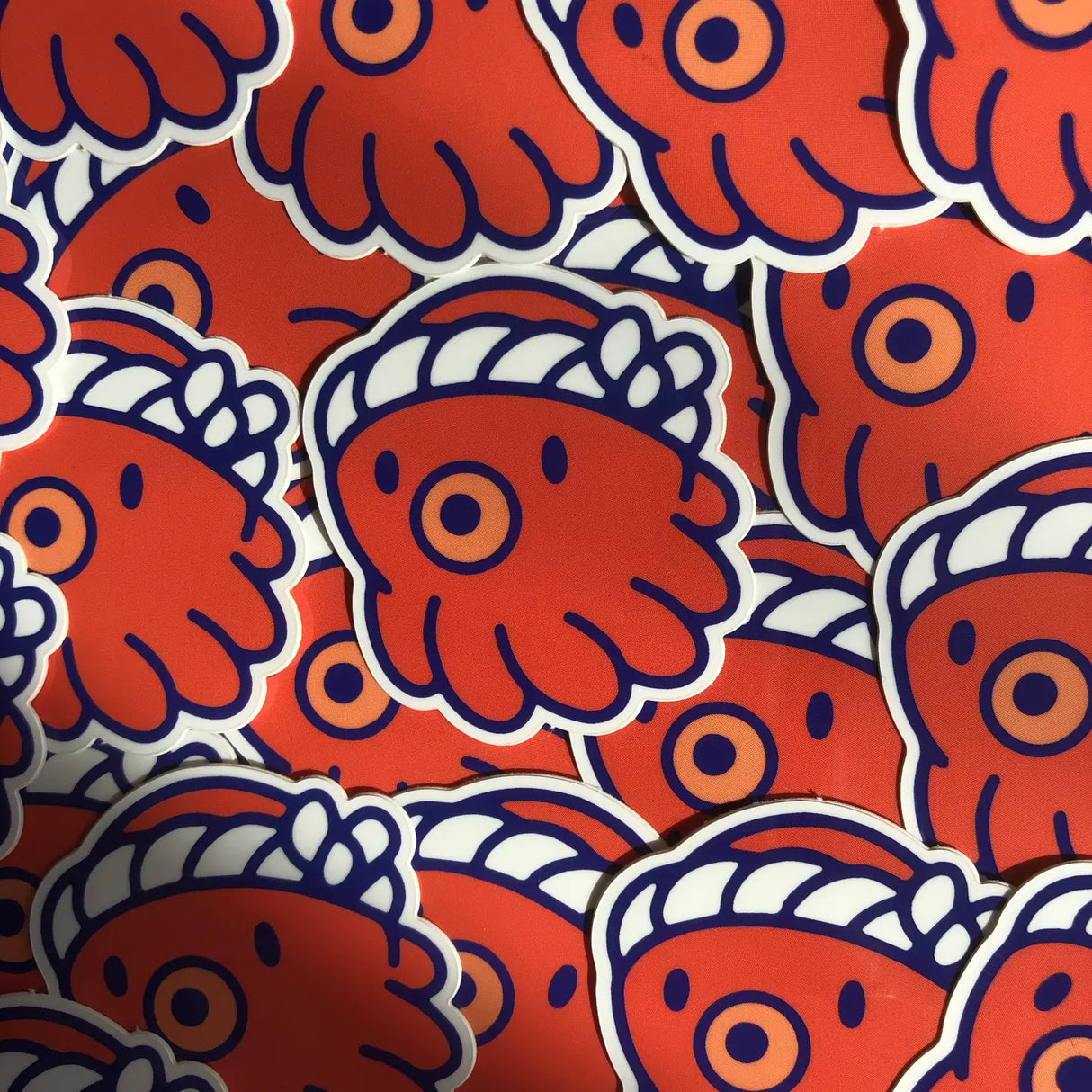 Lil Tako is one of our original characters. It is inspired by the mascots that can be found on the front of takoyaki stands, these small dumplings filled with octopus.
• Vinyl sticker
• 4 x 4.3 cm
• PVC free
• Anti-UV varnish
• Can be used outside
• Printed in Sweden