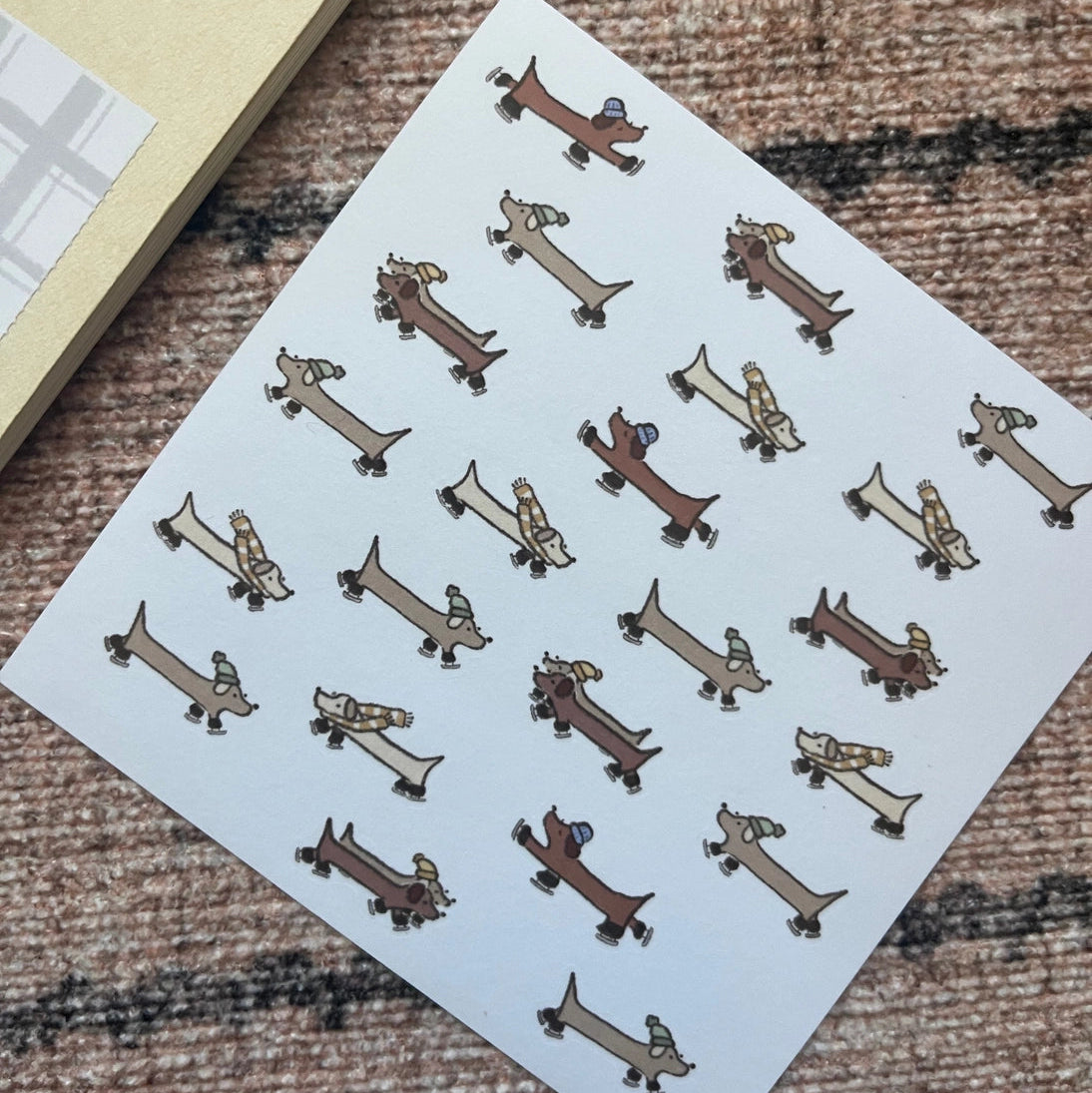Ice skating sausages everywhere!
Includes 1 sticker sheet
Measurements: 10 cm x 10 cm