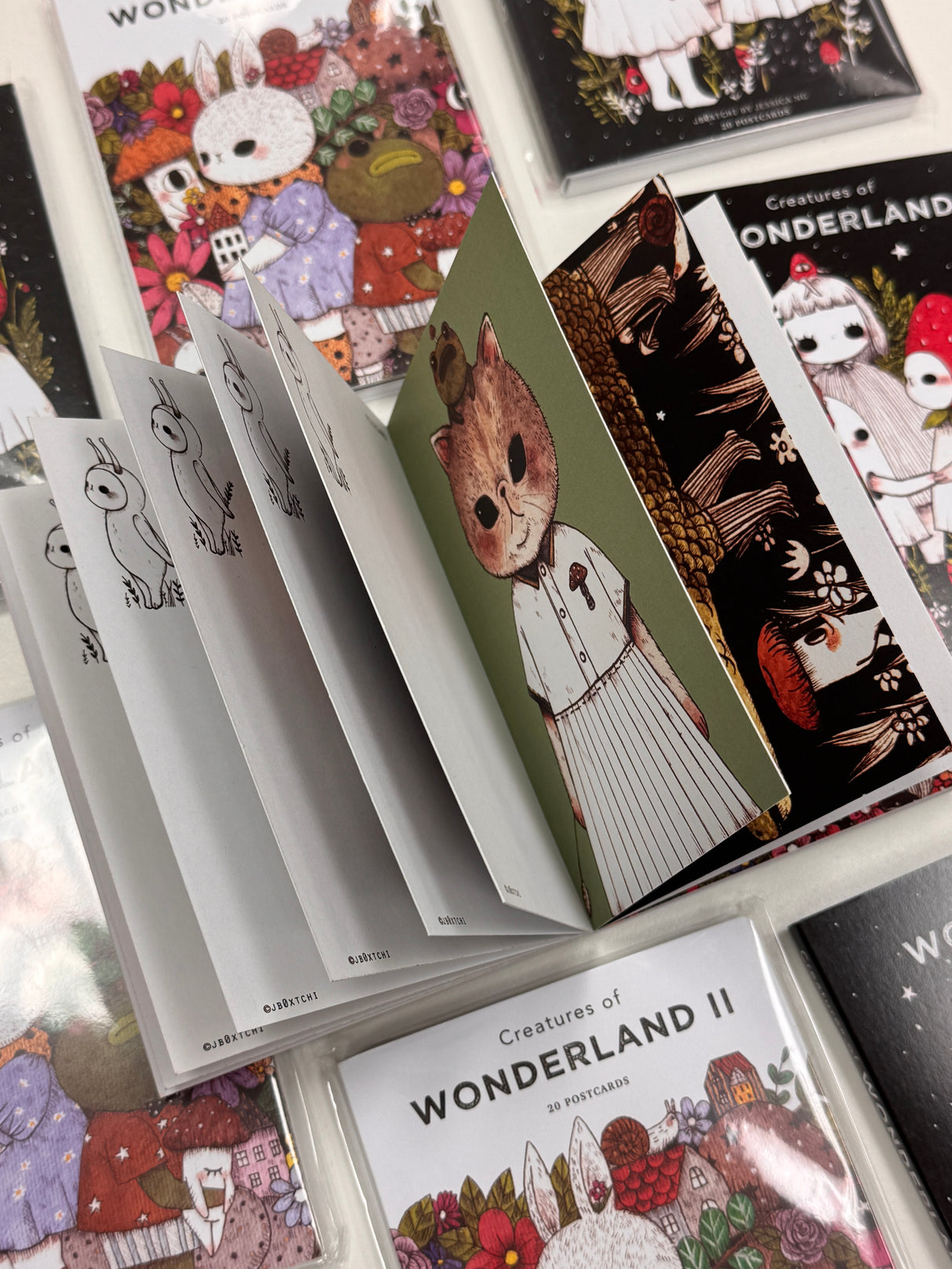 jb0xtchi Postcard Set - Creatures of Wonderland 2
The Creatures of Wonderland 2 Postcard Set includes 20 postcards featuring artwork illustrated by jb0xtchi (Jessica Ng). jb0xtchi creates stationary and small trinkets from whimsical ideas in the form of painting using ink, watercolor, and gouache.
6in x 4in postcards
20 different designs
All artwork done by Jessica Ng
