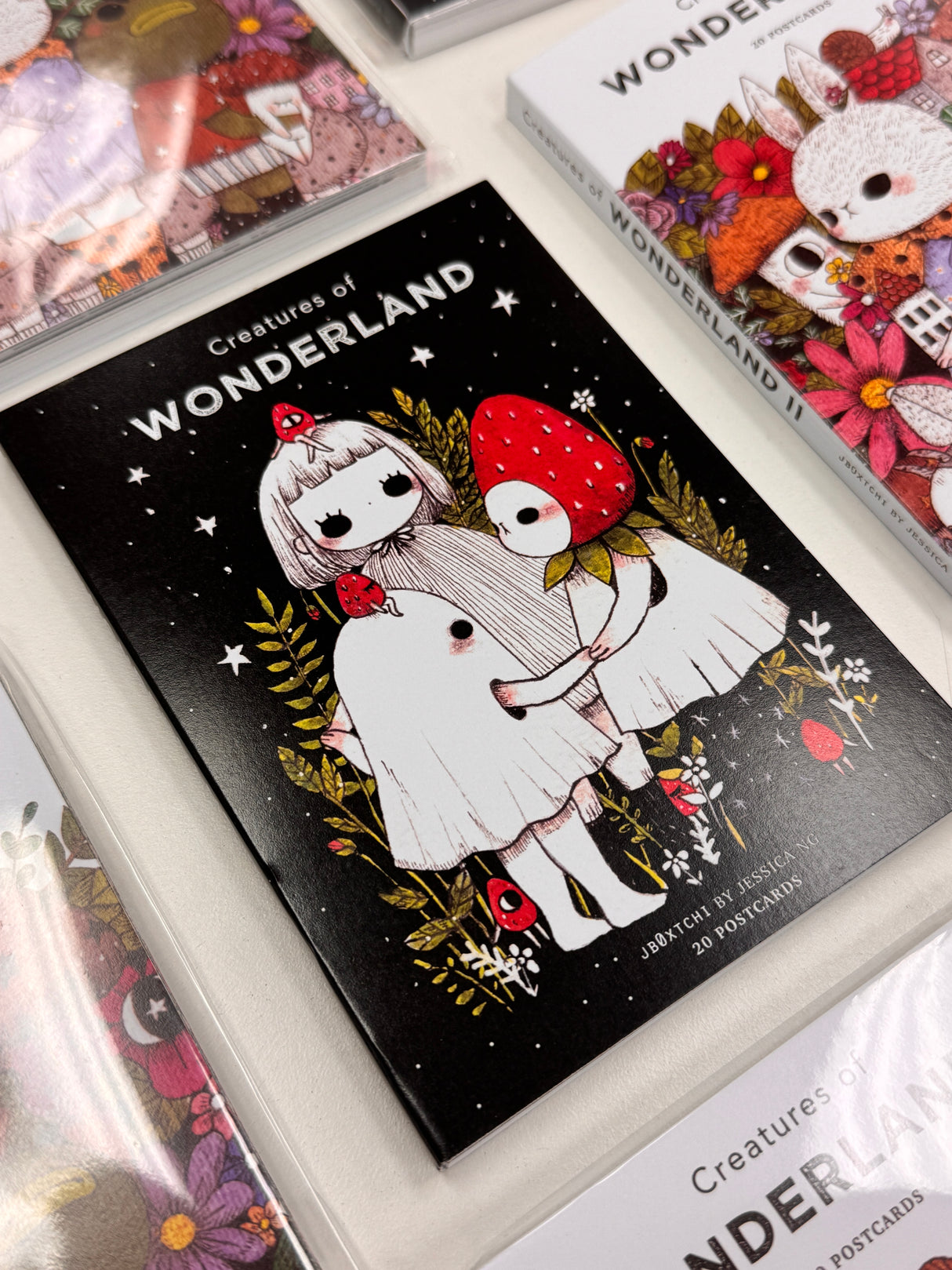 jb0xtchi Postcard Set - Creatures of Wonderland
The Creatures of Wonderland Postcard Set includes 20 postcards featuring artwork illustrated by jb0xtchi (Jessica Ng). jb0xtchi creates stationary and small trinkets from whimsical ideas in the form of painting using ink, watercolor, and gouache.
6in x 4in postcards
20 different designs
All artwork done by Jessica Ng