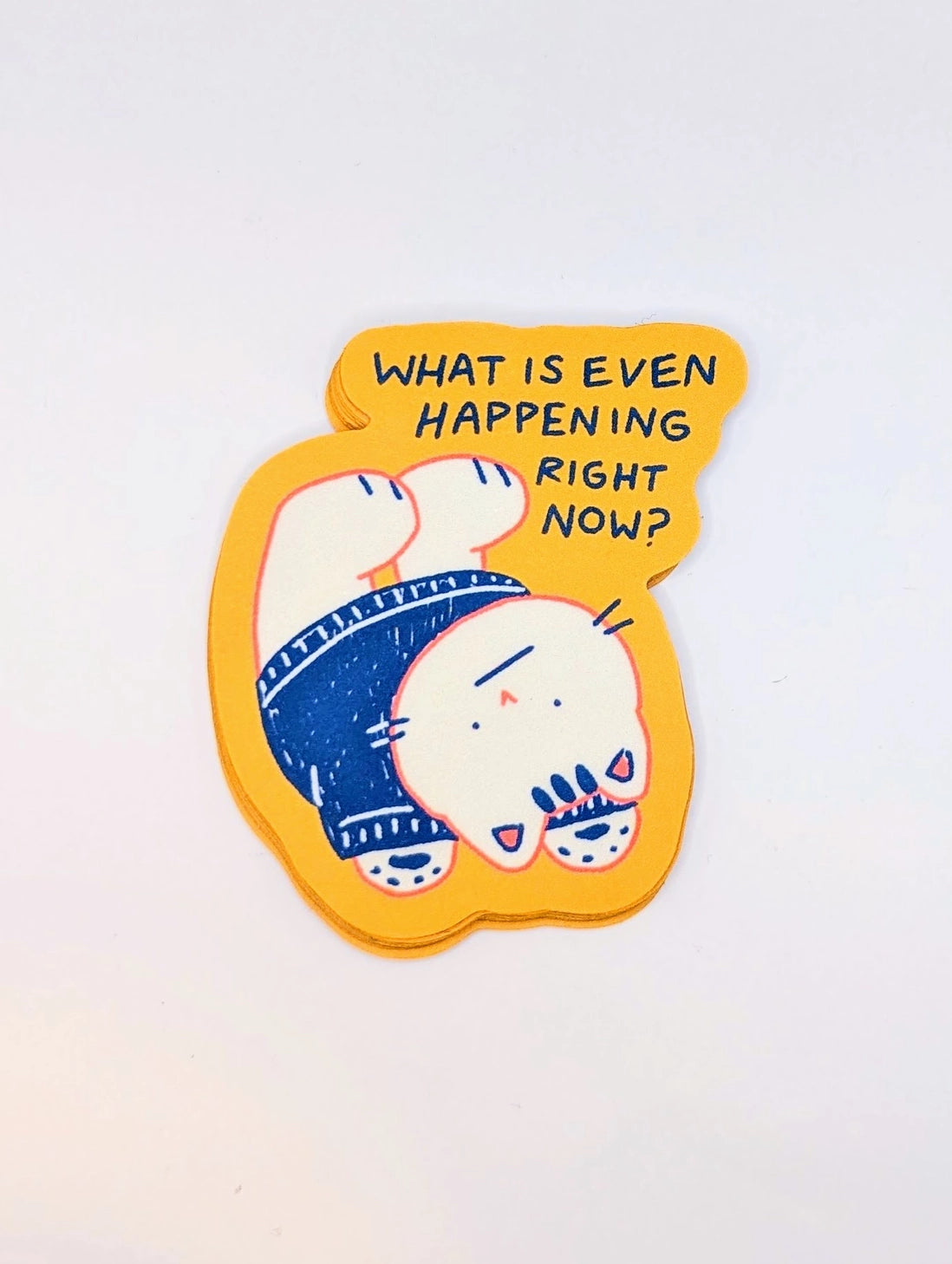 Feeling overwhelmed by the absurdity of the world? This existential crisis cat sticker perfectly captures that what is even happening right now? moment we all experience—especially in today’s political climate. Featuring a cute cartoon cat lying belly-up in pure bewilderment, this funny political sticker blends humor with relatable frustration.