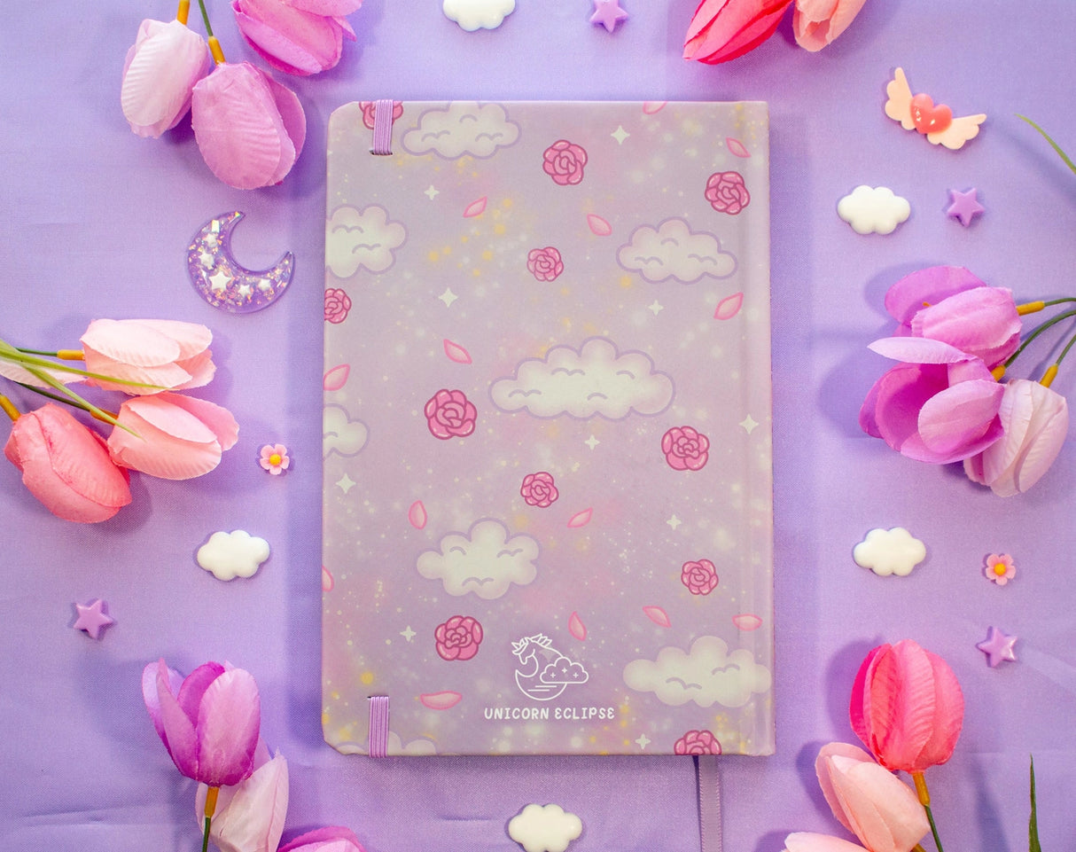 Unicorn Eclipse - Pastel Academia Dotted Journal
✧Size & Materials✧
Size: A5 (approximately 5.8 x 8.3 inches)
Smooth hardcover, rounded corners
160 dot grid pages, 140 gsm
Includes ribbon bookmark, elastic band, and back pocket