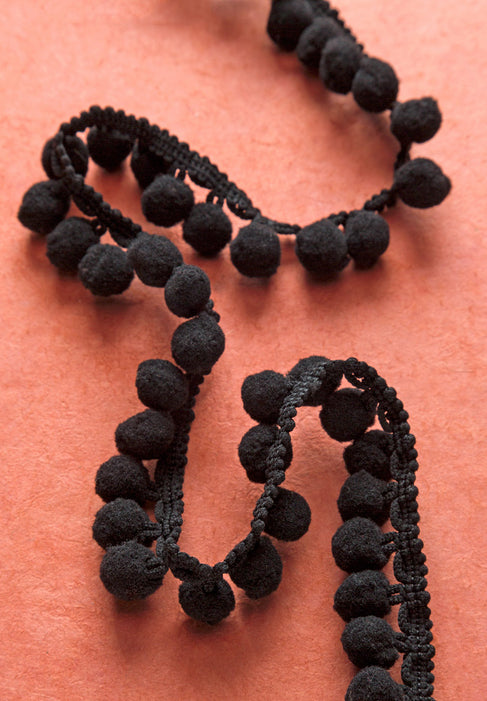 Pompón negro de 12 yardas
