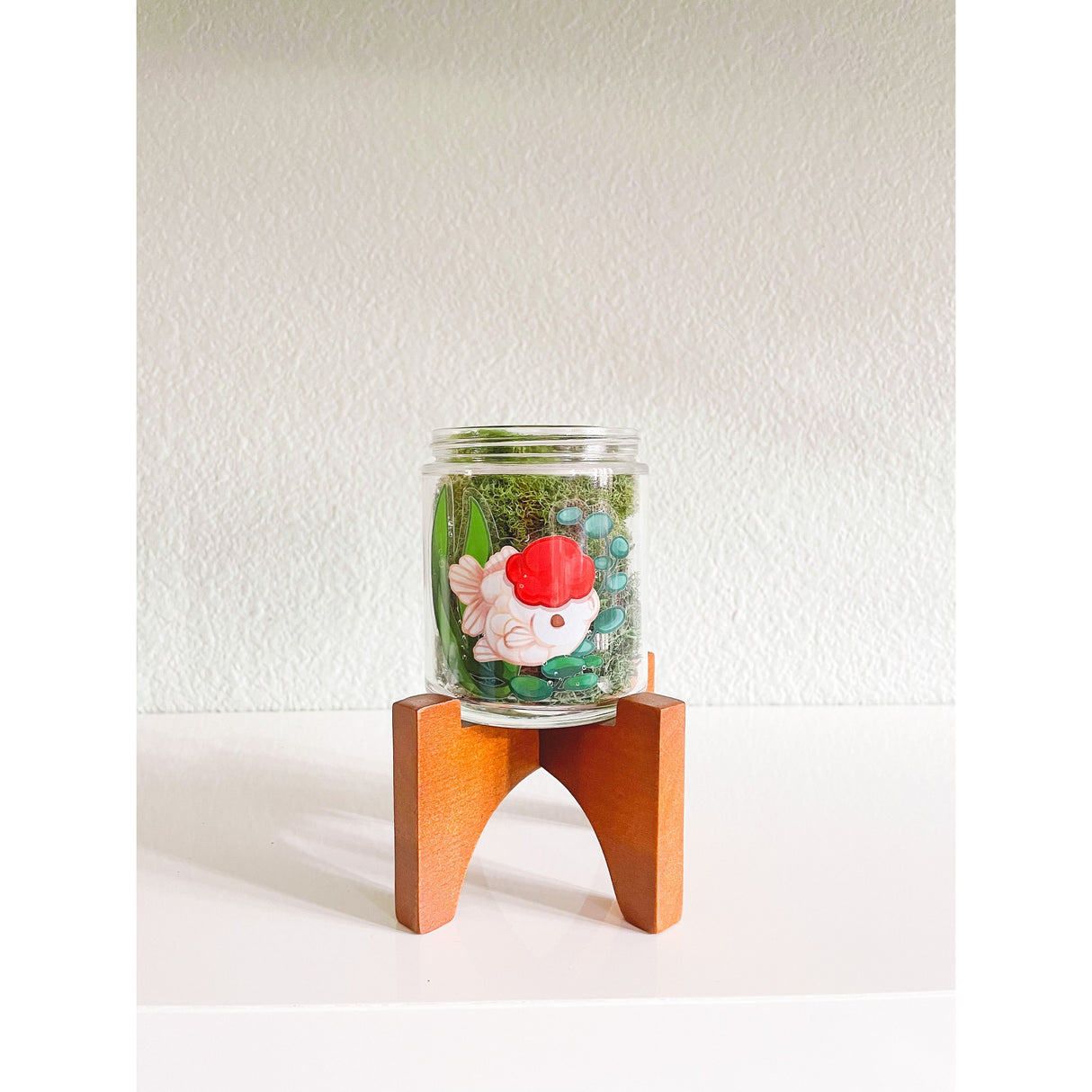 Pegatina transparente de pez dorado de lujo con gorra roja Oranda