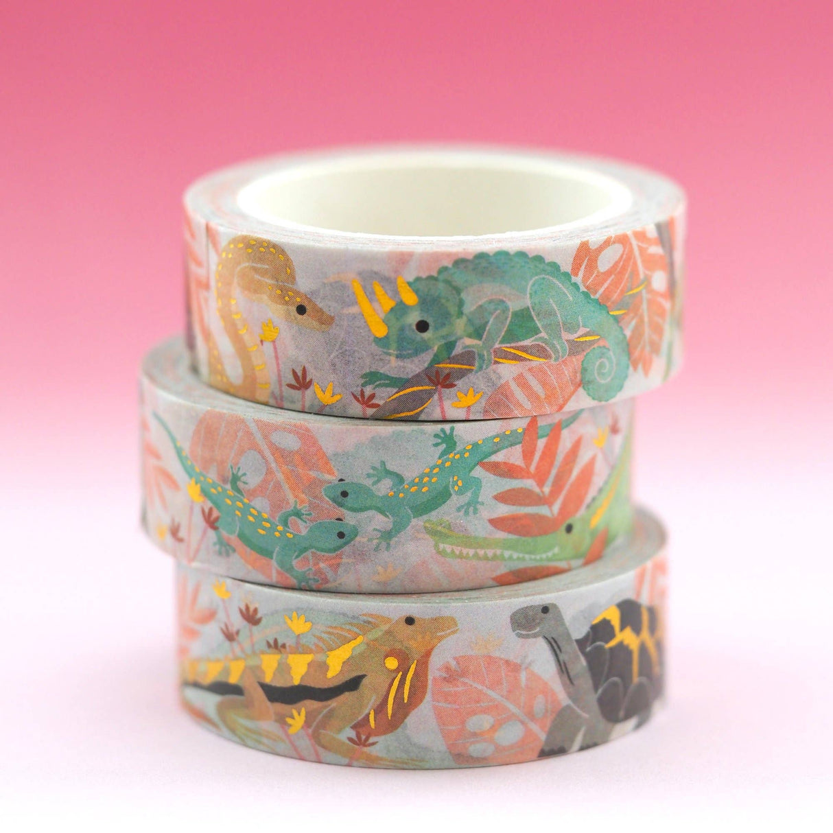 This cute washi tape features eight scaly species: Jackson's chameleon, emerald boa, iguana, Galapagos tortoise, Tokay gecko, Gharial, Brookesia micra (the smallest known chameleon), and Burmese python.