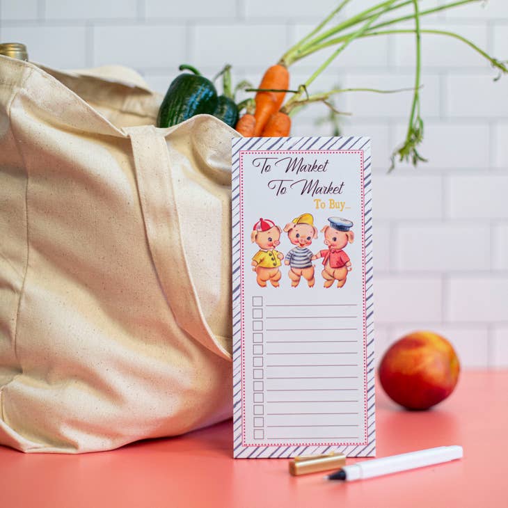 Bloc de notas con la lista de mercado de Los tres cerditos