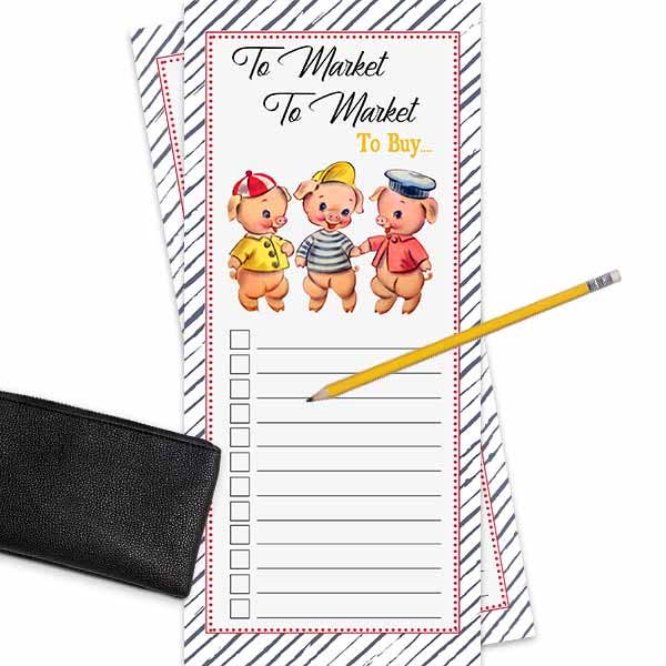 Bloc de notas con la lista de mercado de Los tres cerditos