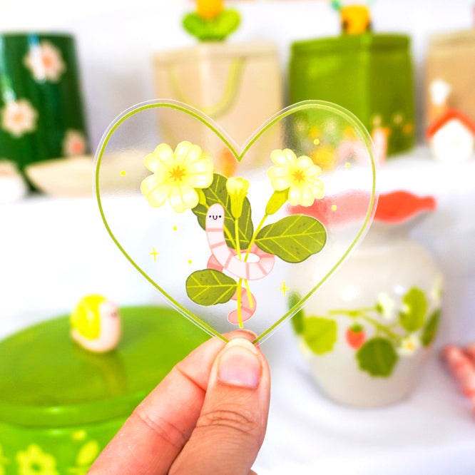 Pegatina de vinilo amarillo con forma de flor y corazón de gusano