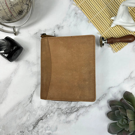 Indulge in the epitome of elegance with the Girologio 12 Zippered Pen Case. Meticulously crafted from premium, eco-friendly tanned leather, this zippered case promises a lavish velvet interior and generous space to securely accommodate up to 12 pens. Girologio once again emerges as a superior choice for safeguarding your cherished writing instruments, seamlessly combining plush softness and flexibility with unparalleled toughness and durability.