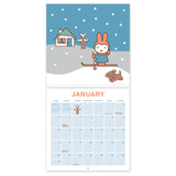 Miffy makes every season sweeter! This perfectly sized 7" × 7" Wall Calendar brings Miffy’s adventurous spirit to your home or workspace all year. From breezy autumn bike rides to sunny springtime gardening, each month showcases Miffy and friends in soft pastel scenes that capture the magic of everyday moments—plus roomy calendar grids with space to jot down plans, reminders, and special occasions.

• 7"w x 7"h closed 
• 12 months (Jan.–Dec. 2027) 
• 13 pages; 150 gsm acid-free, FSC®-certified paper 
• Sadd