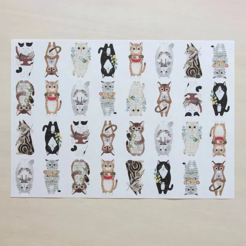 Featuring charming watercolor of different cats from Japanese illustrator 4legs.

This A4 sized paper set includes 20 sheets of paper with the same design featuring over 12 different cat drawings. Perfect to use as wrapping paper,&nbsp;making small bags, or using it as a book cover.

Contents: 20 sheets
Size: A4 size (210×297mm)
Paper type/thickness: About the thickness of copy paper