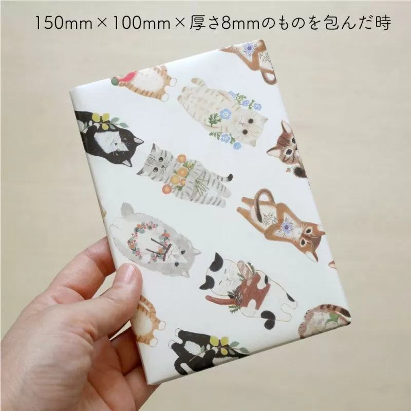 Featuring charming watercolor of different cats from Japanese illustrator 4legs.

This A4 sized paper set includes 20 sheets of paper with the same design featuring over 12 different cat drawings. Perfect to use as wrapping paper,&nbsp;making small bags, or using it as a book cover.

Contents: 20 sheets
Size: A4 size (210×297mm)
Paper type/thickness: About the thickness of copy paper