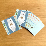 4legs Cat Memo - New #3 Shiro-Neko

Featuring charming watercolor of a cat holding a shell from Japanese illustrator 4legs

It is a convenient size that is not too big or too small.&nbsp;Please use it&nbsp;as a communication tool for small thank you and announcements.&nbsp;There are no lines on the front side, so&nbsp;you can use it freely as&nbsp;a shop card or business card&nbsp;with stamps and stickers&nbsp;as well as memos and letters.&nbsp;It is a great gift for people who like paper.&nbsp;The gorgeous