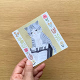 Featuring charming watercolor of a cat from Japanese illustrator 4legs

It is a convenient size that is not too big or too small.&nbsp;Please use it&nbsp;as a communication tool for small thank you and announcements.&nbsp;There are no lines on the front side, so&nbsp;you can use it freely as&nbsp;a shop card or business card&nbsp;with stamps and stickers&nbsp;as well as memos and letters.&nbsp;It is a great gift for people who like paper.&nbsp;The gorgeous and gentle designs&nbsp;will make you feel warm and