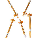 5 Pair Bamboo Chopsticks and Shiba Porcelain Chopsticks Rest Gift Set. This Chopstick and Rest Gift Set Comes 5 Pair Bamboo Chopsticks with 5 piece assorted cats chopsticks rest in gift box packaging. Chopstick Rests are Dishwasher Safe. Gorgeous Box, Perfect Asian Gift for Holidays and any Occasion.

Size: 9 inch chopsticks, 2.25 inches W chopsticks rest
Material: Bamboo and Ceramic
Origin: China