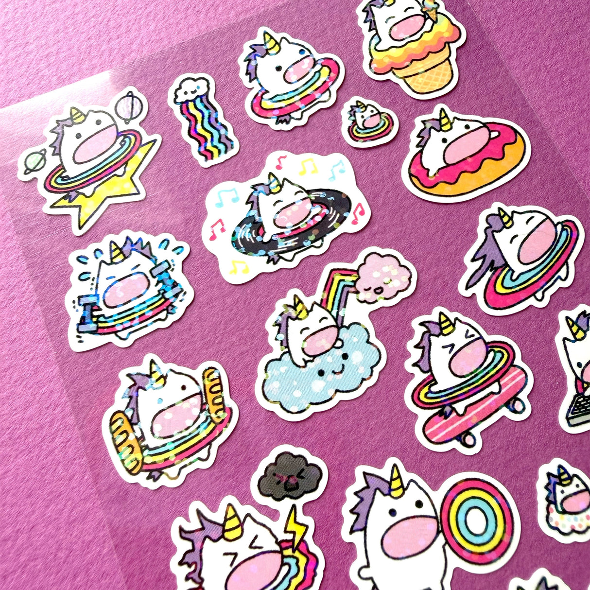This is part of a new series of sticker sheets that feature different "days".

There are 24 individual stickers on the sheet full of dessert cuteness.

They are vinyl stickers on a clear plastic sheet with a backing card and packaging that's ready to display.

&nbsp;The whole packaging is 3.8 x 8.75" and is ready to hang. The sticker sheet is 3.75 x 5.8"