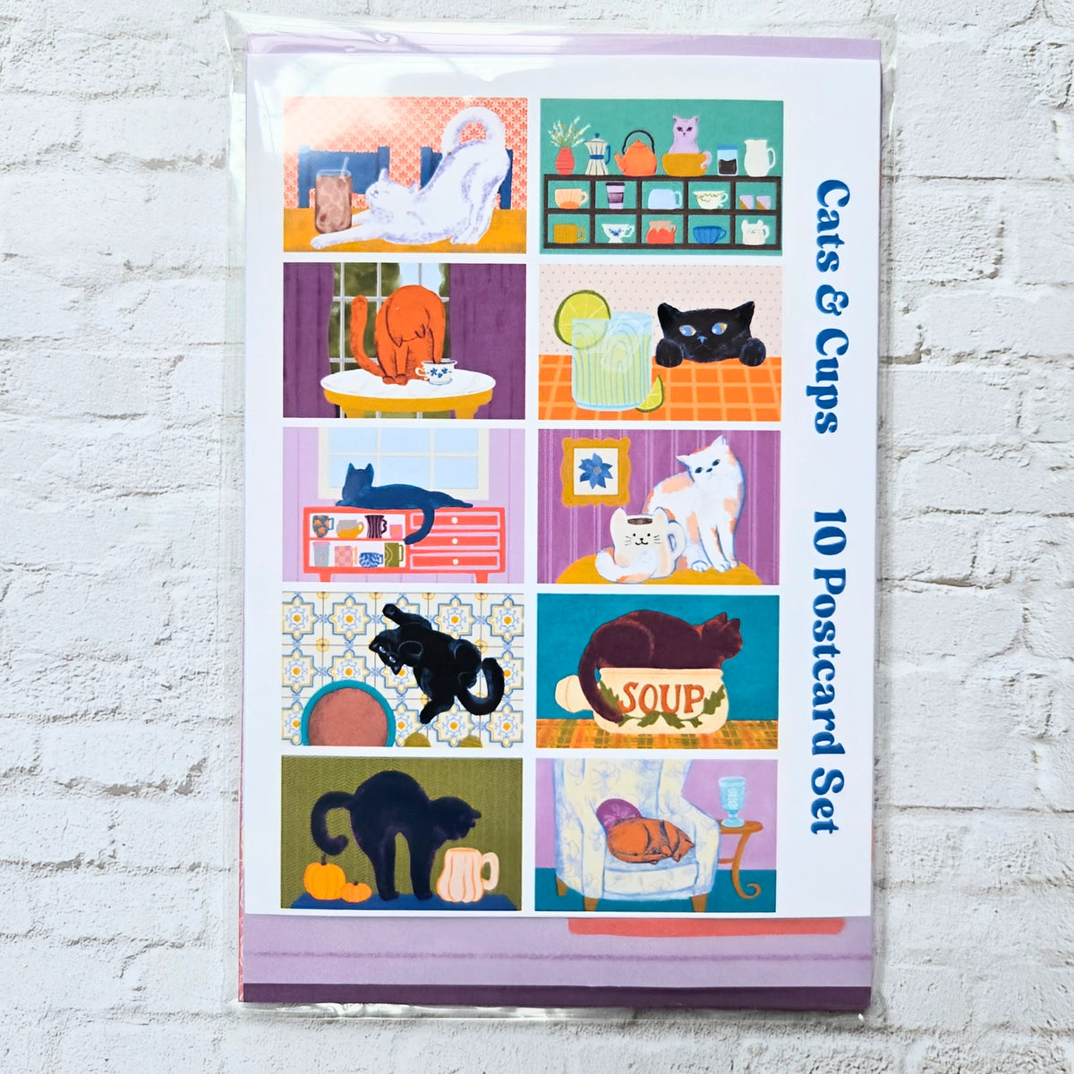 AddPeace Studio - Cats &amp; Cups Postcard Pack

A charming illustrated postcard set for cat lovers, homebodies, and anyone craving a little analog joy. This Cats &amp; Cups postcard pack celebrates quiet moments, warm drinks, and the simple pleasure of sending real mail. Designed for the current resurgence of snail mail, pen pals, and intentional connection, these postcards make it easy (and fun) to go offline on purpose.

Each set includes ten unique 4x6 postcards featuring original Cats &amp; Cups illust