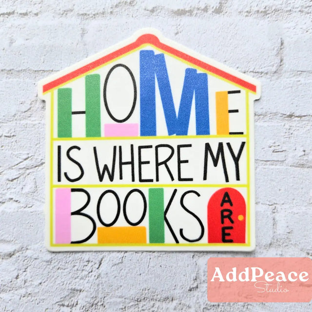 AddPeace Studio - Home Is Where My Books Are Vinyl Sticker

A colorful waterproof vinyl sticker for readers, introverts, and book lovers. Perfect for laptops, journals, and water bottles, because home isn’t a place. It’s a stack of well-loved books. This simple, heartfelt design celebrates the deep comfort of being surrounded by stories. A gentle statement piece for readers who find belonging, rest, and joy wherever their books live. Illustrated by a real human and made to feel familiar in the best way.

De