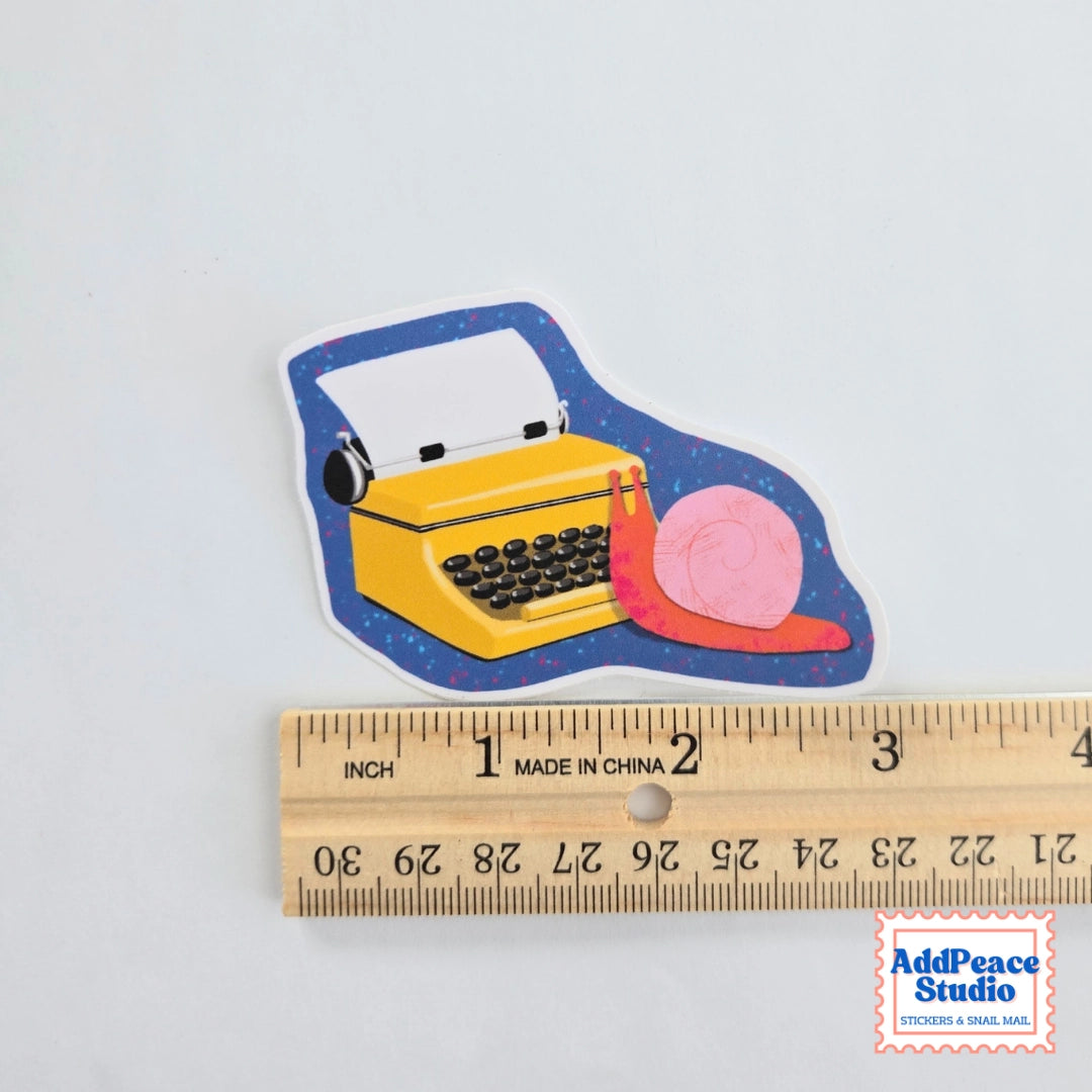 AddPeace Studio - Snail At Typewriter Vinyl Sticker

This illustrated sticker features a snail at a bright yellow typewriter, fully immersed in the writing process and bringing big creative ideas to life.

Details:


Size: 2.5"
Material: Waterproof, scratch-resistant matte vinyl

Made in USA, original artwork by AddPeace Studio