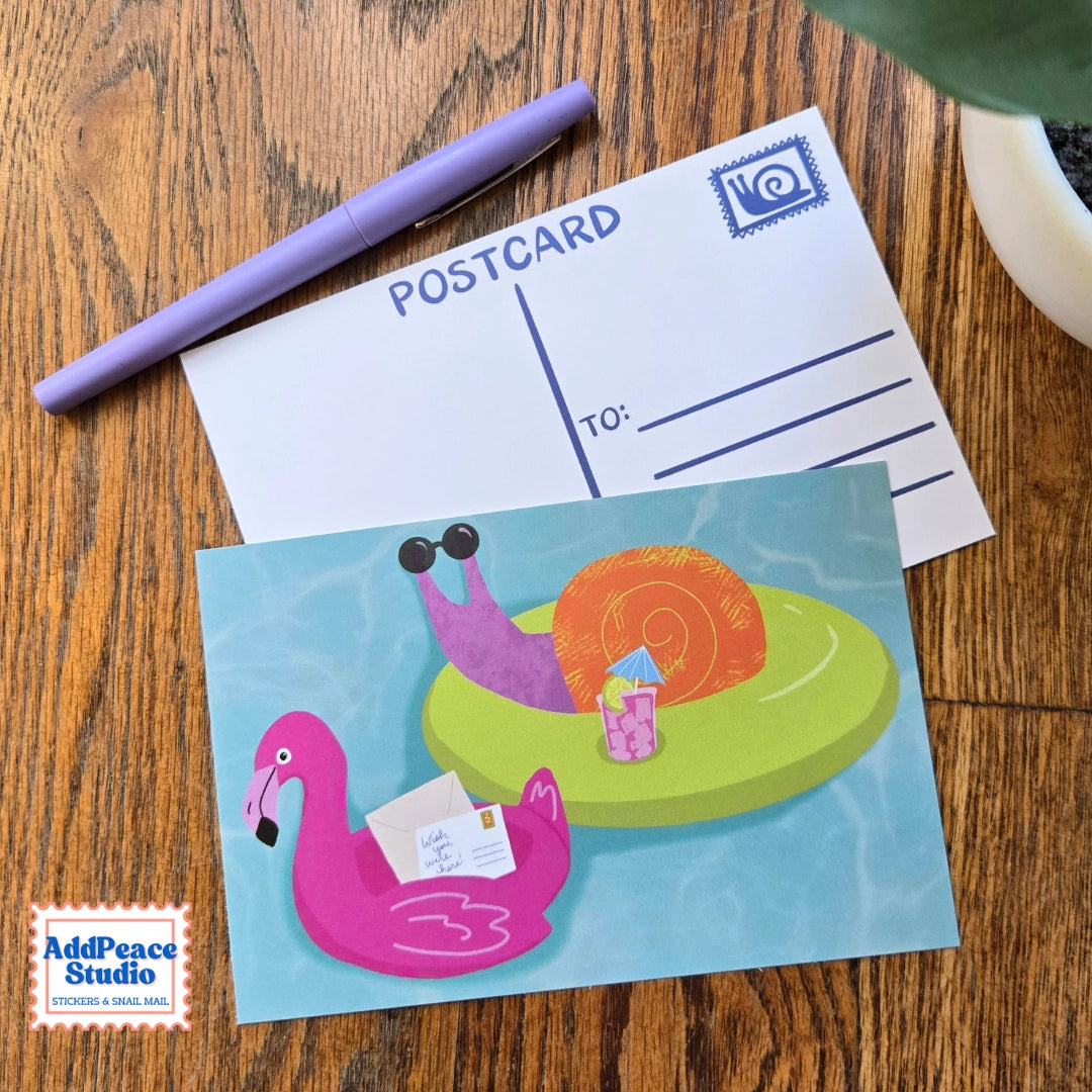 A love letter to snail mail and the joy of sending something real. This 12 postcard set features bright, imaginative illustrations centered around writing, reading, and the magic of meaningful connection.

Details

Set of 12 unique illustrated postcards
Professionally printed on sturdy matte cardstock
Standard postcard size: 4 x 6 inches
Illustrated by AddPeace Studio
Made in the USA