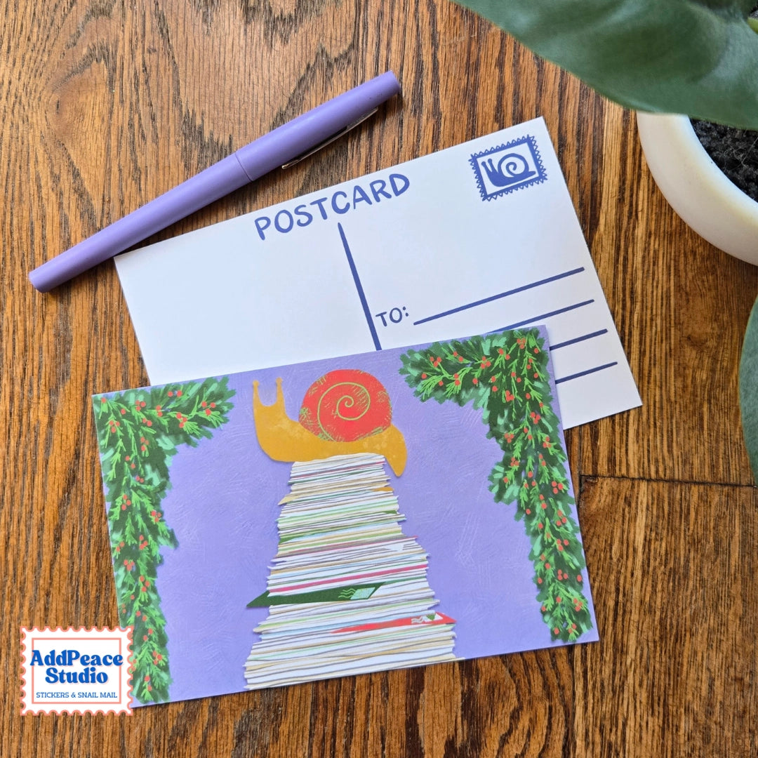 A love letter to snail mail and the joy of sending something real. This 12 postcard set features bright, imaginative illustrations centered around writing, reading, and the magic of meaningful connection.

Details

Set of 12 unique illustrated postcards
Professionally printed on sturdy matte cardstock
Standard postcard size: 4 x 6 inches
Illustrated by AddPeace Studio
Made in the USA