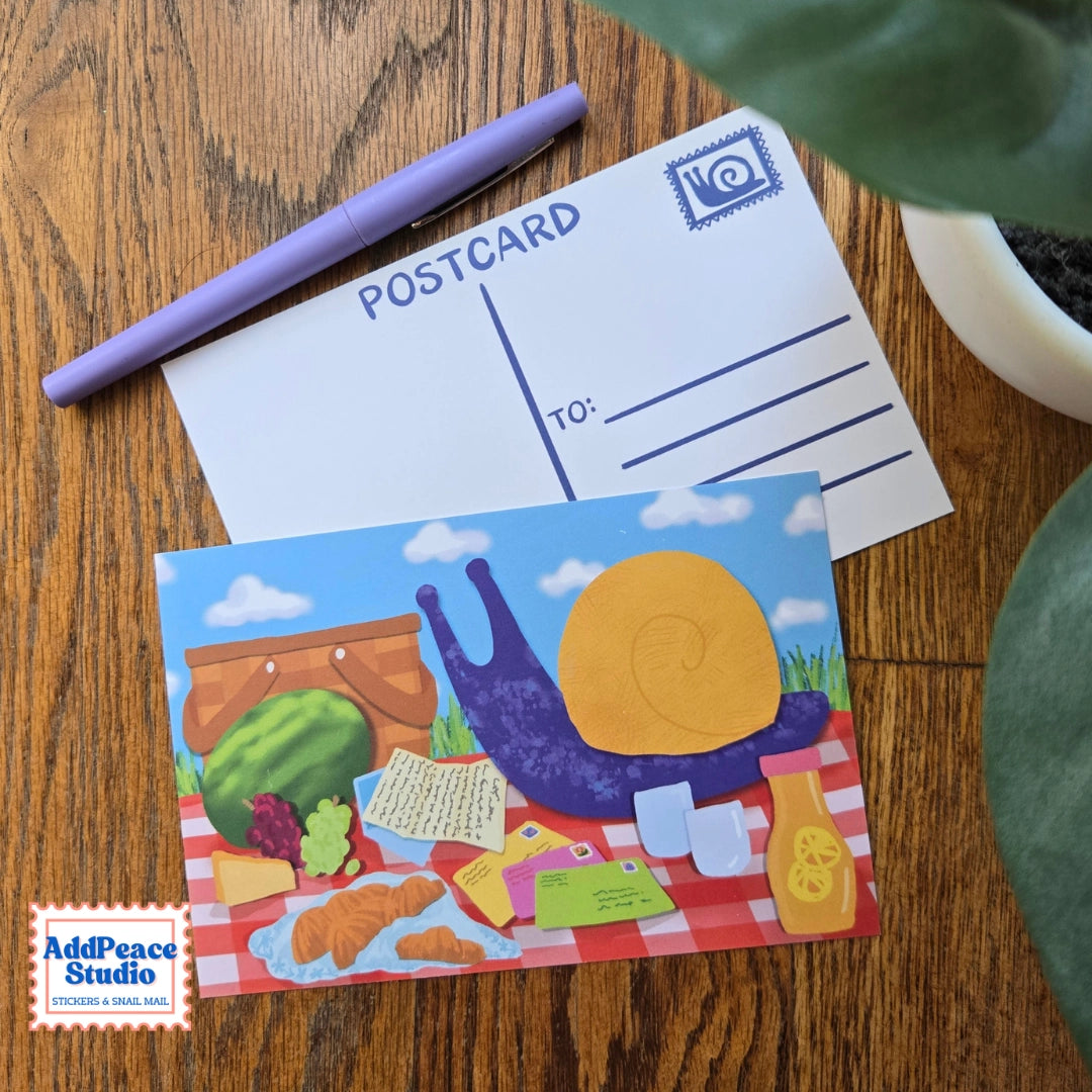 A love letter to snail mail and the joy of sending something real. This 12 postcard set features bright, imaginative illustrations centered around writing, reading, and the magic of meaningful connection.

Details

Set of 12 unique illustrated postcards
Professionally printed on sturdy matte cardstock
Standard postcard size: 4 x 6 inches
Illustrated by AddPeace Studio
Made in the USA