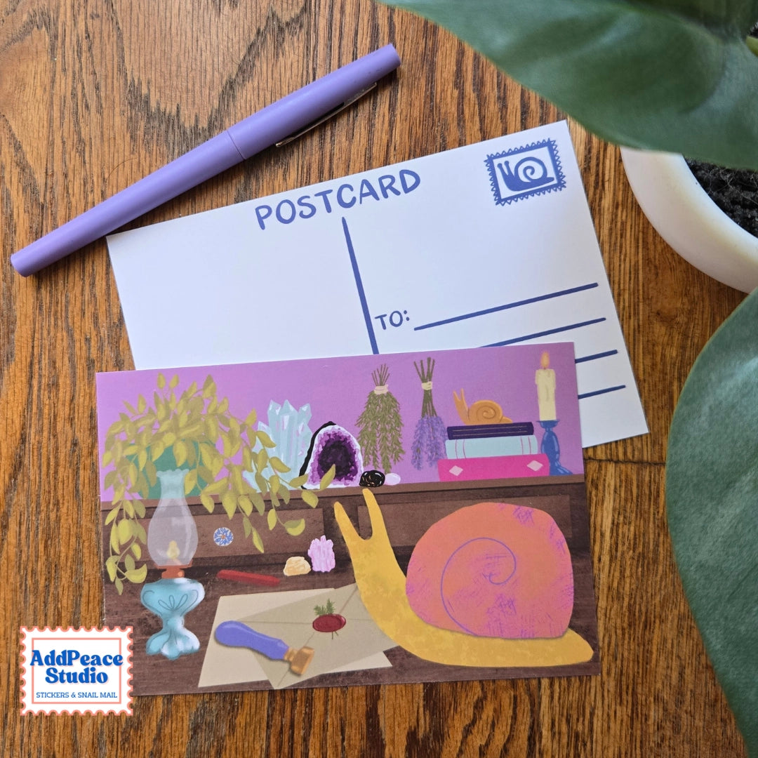 A love letter to snail mail and the joy of sending something real. This 12 postcard set features bright, imaginative illustrations centered around writing, reading, and the magic of meaningful connection.

Details

Set of 12 unique illustrated postcards
Professionally printed on sturdy matte cardstock
Standard postcard size: 4 x 6 inches
Illustrated by AddPeace Studio
Made in the USA