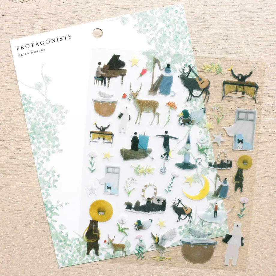 Stickers of illustrator Akira Kusaka. This sticker sheet is packed with beautiful drawings of animals playing instruments, perfect for any music lover.


Printed on PET material, the stickers have a smooth, durable finish that’s easy to peel and place - great for both everyday use and special projects.

✨ Product Details

Smooth, durable PET sticker material
Perfect for planners, journals, scrapbooking, and cardmaking
Backing Sheet Size: 141 × 188 mm
Sticker sheet size: 138 × 170 mm