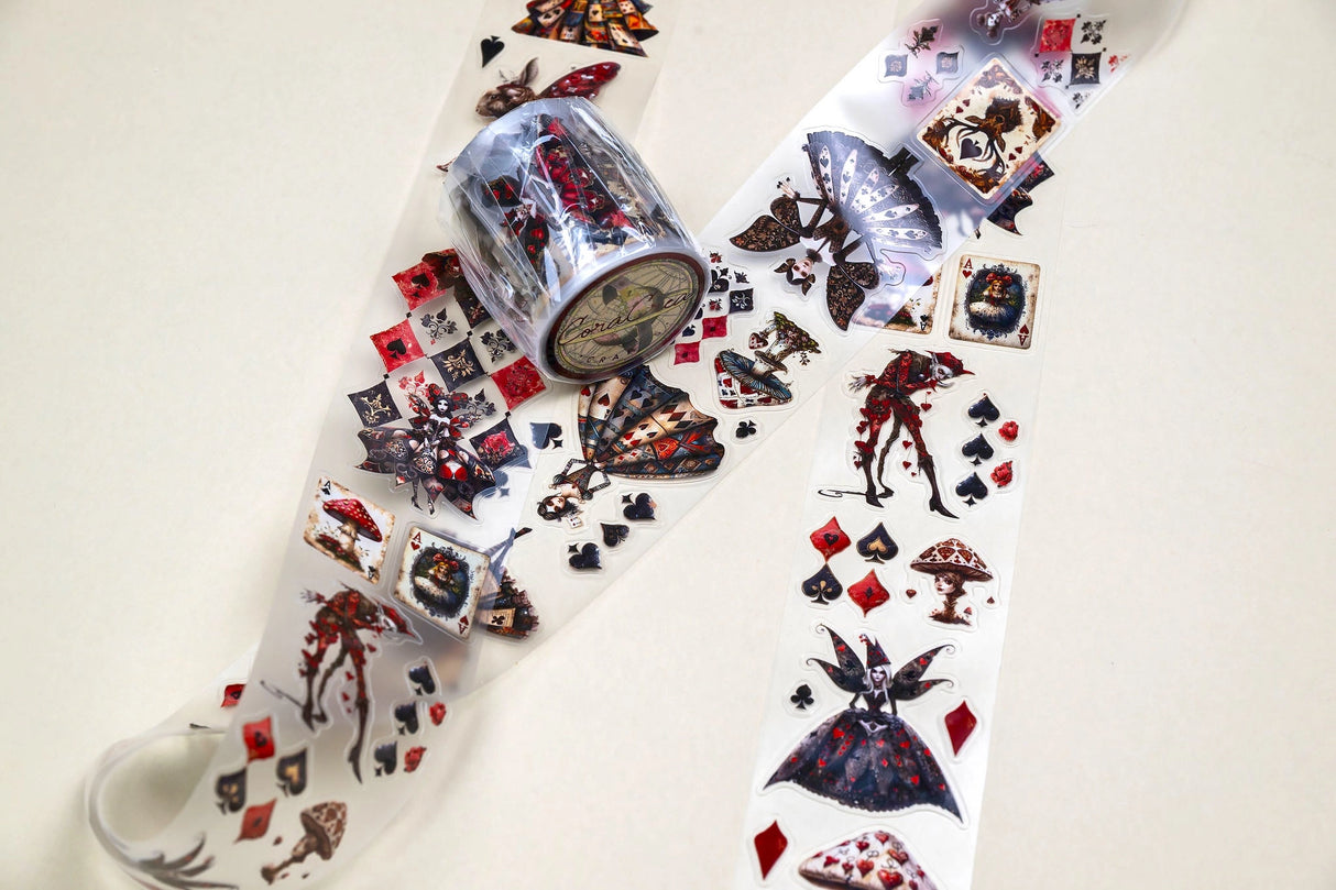 Step into the world of Alice's Wonderland with this unique transparent PET tape by CoraCreaCrafts. Designed with an intricate mix of dark Wonderland-inspired stickers and vintage Queen of Hearts styles. This tape is 5cm wide with a 100cm repeat loop making it 5m long, precut designs (like stickers), showcasing a variety of detailed designs.
The glossy finish adds a sophisticated shine, making it perfect for adding a touch of moody charm to your creative projects.