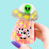 Alien UFO Hair Claw' Hair Accessory by Turtle's Soup.

Includes one (1) hair claw
Claw is roughly 3"
3D, engraved, printed, and painted details
High quality acetate material, stronger than standard hair clips
Themed packaging