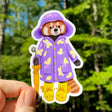 This weatherproof vinyl sticker features my illustration of a red panda dressed up in a butterfly raincoat. Her caterpillar boots and coordinating yellow umbrella complete the ensemble!